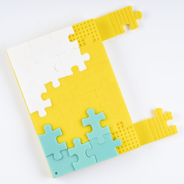 VÝSTUP Vtipný sešit A6 s puzzle ve žluté a modré barvě jako dárek
